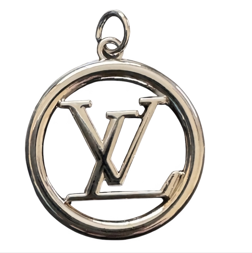 Louis Vuitton  28mm charm/ Zipper Pull.  Bigger Than A Quarter